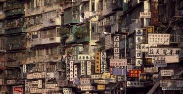 History of the world's most populous sanctuary of drinking, drugs, prostitution and idleness The Walled City of Kowloon