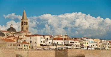 Sardinia - historic Alghero and the fabulous beach of La Pelosa Sardinia Alghero attractions